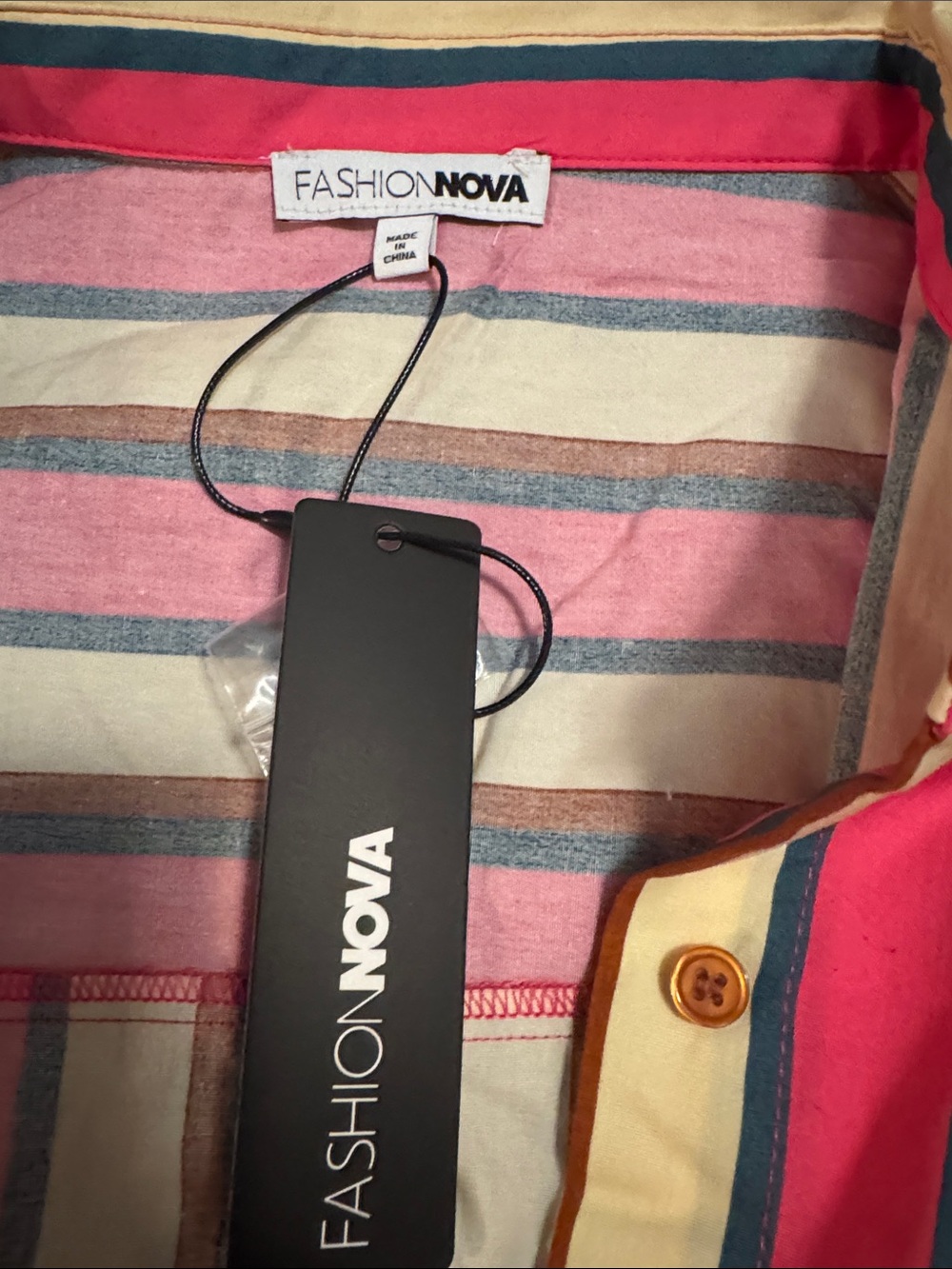 Poplin Shirt
Pink combo striped button down. - Picture 5 of 5